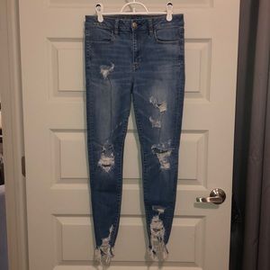 Stretch High-Rise Distressed Jeans